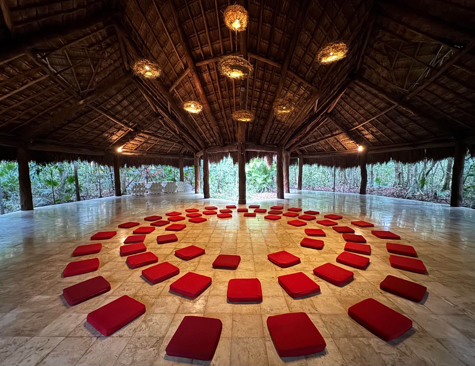 aerial view of OZEN's colorful pavilion in the forest
